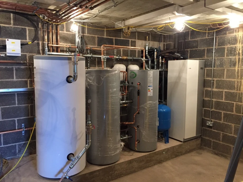 Large plant room installation with multiple cylinders and heat pump