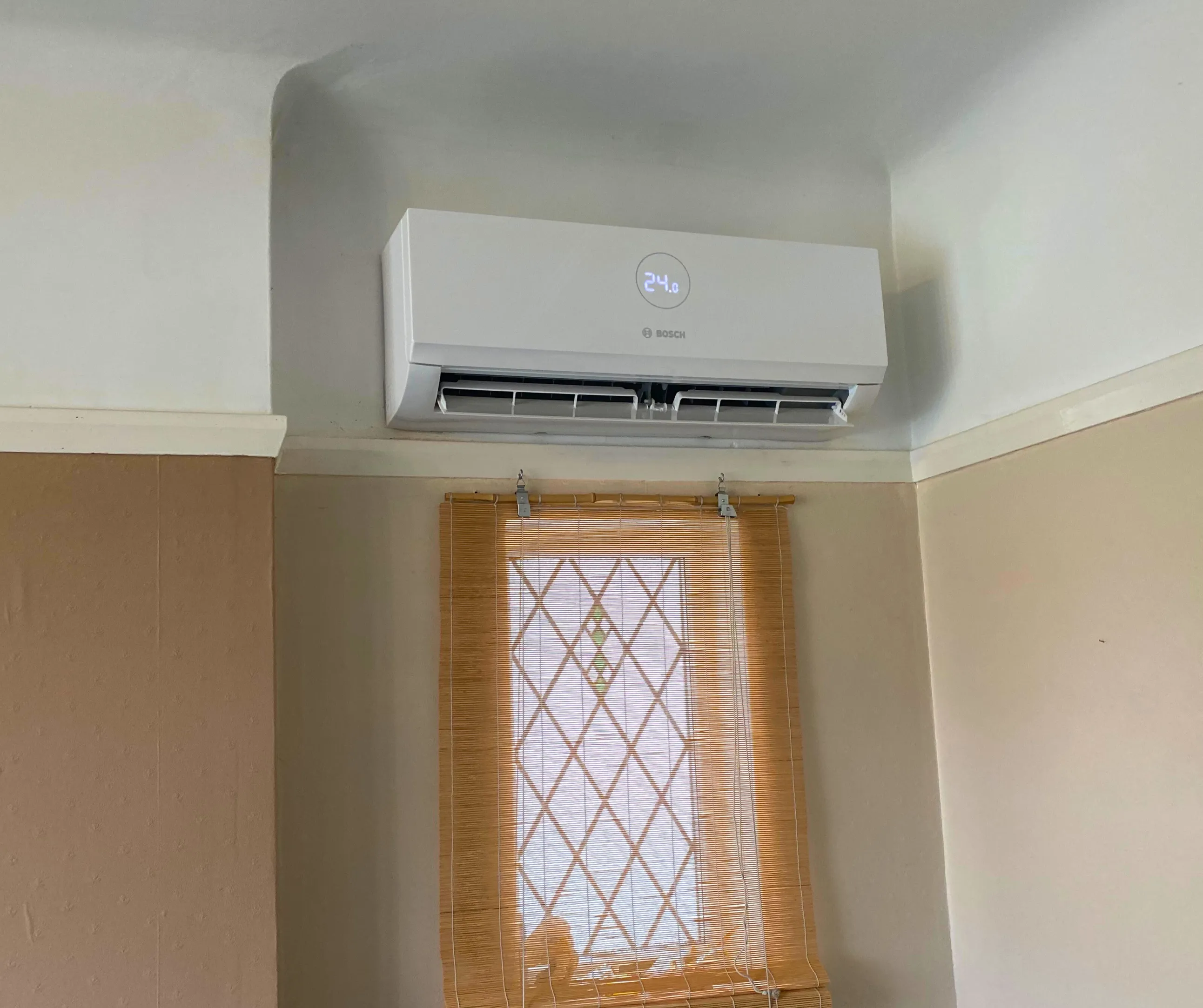 Bosch wall-mounted air conditioning indoor unit set to 24 degrees